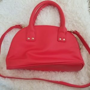 Handbag with shoulder strap